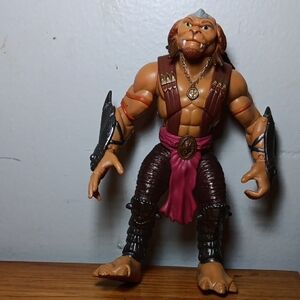 Hasbro Action Figure with Brown and Pink Details
